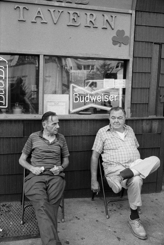 2 man having a smoke, NYC